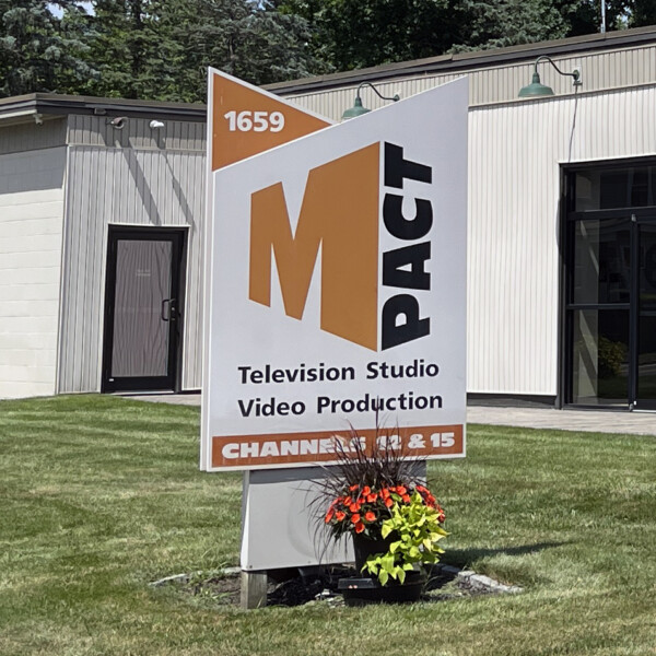 M-Pact TV sign