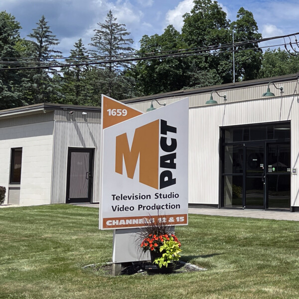 M-Pact TV sign