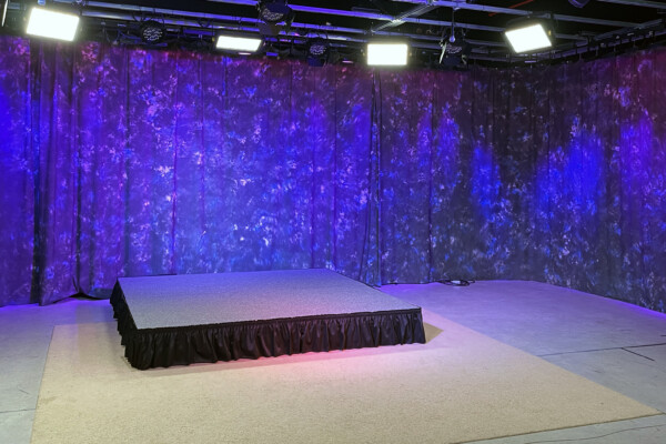 Television studio stage set for community programming at M-PACT TV Palmer MA